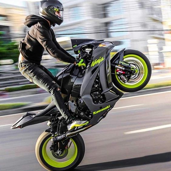 Motorcycle wheelie tutorial.